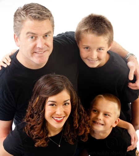 Studio portrait of family of four in Boise, Idaho photographed from above